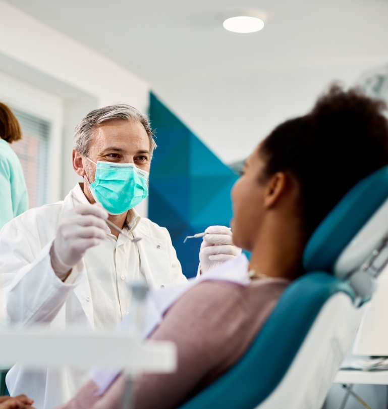 Woman about to receive dental exam in Falmouth dental office