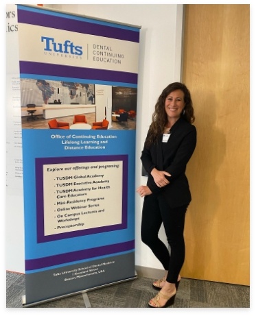 Doctor Chadbourne at Tufts University continuing dental education event
