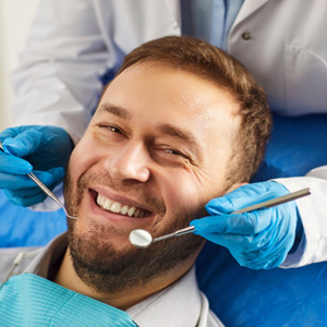 Man smiling during dental checkup